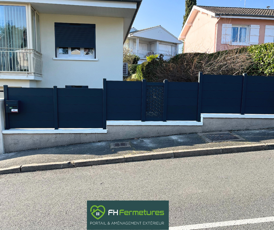 Clôture en alu avec motifs Eolienne